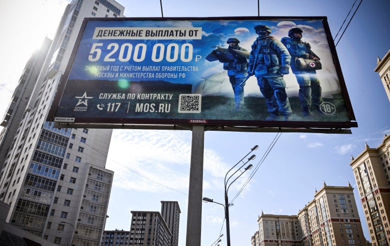 A billboard on display in Moscow in September 2024, promotes contract service with the Russian army.