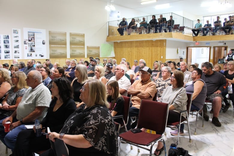 Residents gather inside the Chipman Community Heritage Centre.