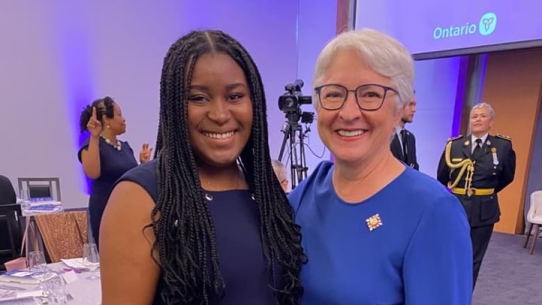 Lladaneyah Gayle is shown with Ontario's lieutenant governor Edith Dumont.