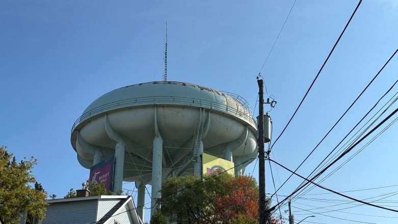 A green water tower.