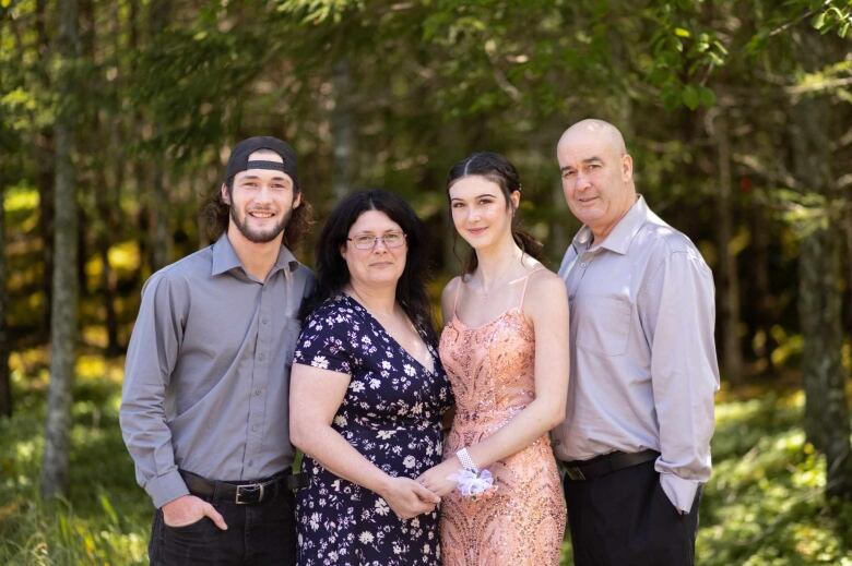 A family poses in nice clothes