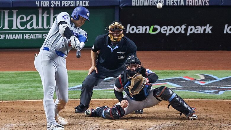 Shohei Ohtani of the Los Angeles Dodgers hits his 50th home run of the season in the seventh inning of a Sept. 19, 2024 game against the hometown Miami Marlins at loanDepot park in Florida.