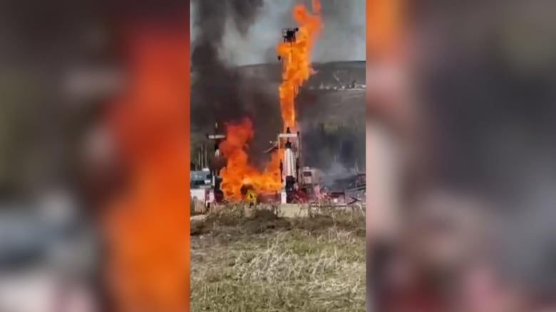 A fire is pictured at a drill site.