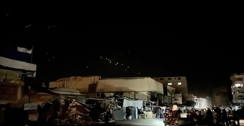 Missile attacks seen in night sky in Gaza.