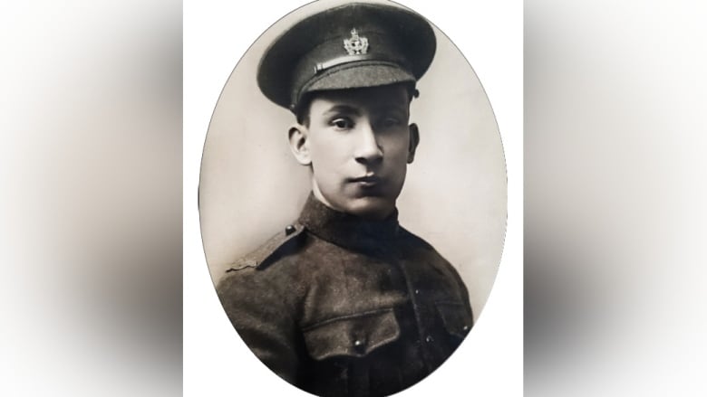 An oval-shaped black-and-white image of a soldier