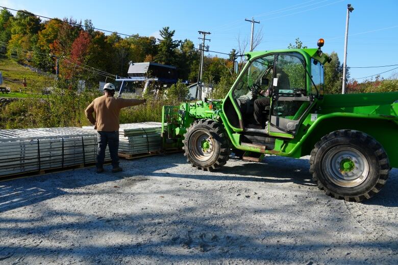 Crews begin to unload materials for new Camp Fortune antenna 