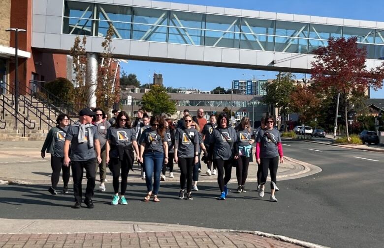 A group of people is walking.