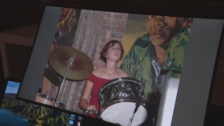 Woman playing the drums