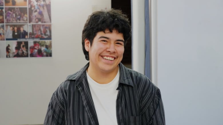 An Algonquin man in a striped shirt.