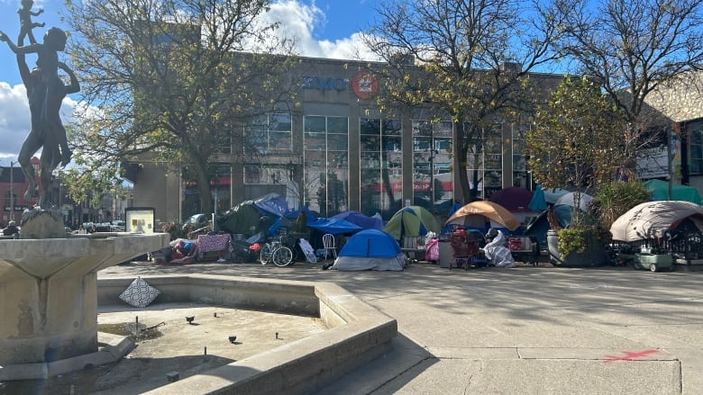 Tents in a downtown square.