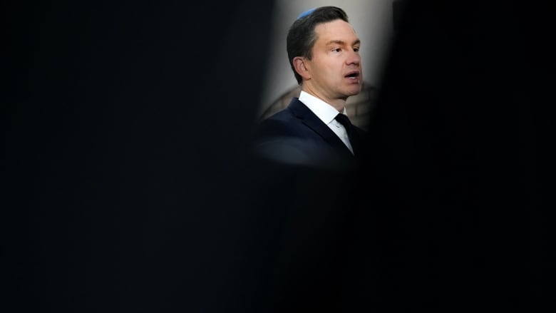 Conservative Leader Pierre Poilievre speaks to the media during a press conference at the Pride of Israel Synagogue in Toronto on Thursday, October 10, 2024.