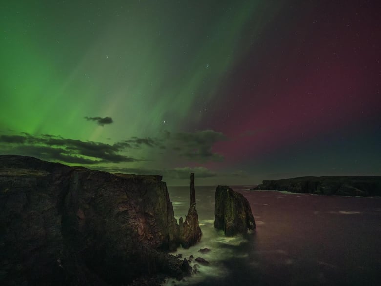 The northern lights fill the sky over spillars.