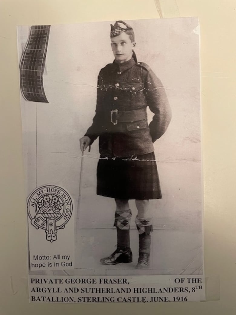 An old photo of a man in an Irish military uniform. 