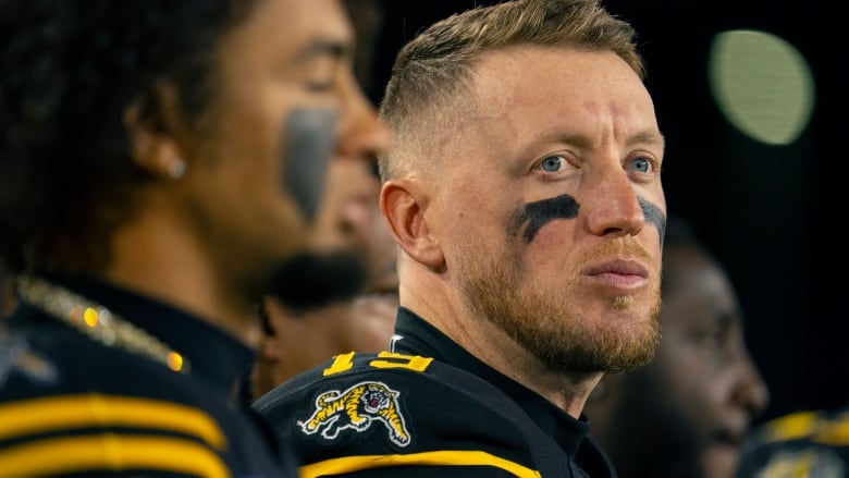 Hamilton Tiger Cats quarterback Bo Levi Mitchell (19) looks on during CFL football action against the Calgary Stampeders in Hamilton, Ont. on Friday, October 18, 2024. 