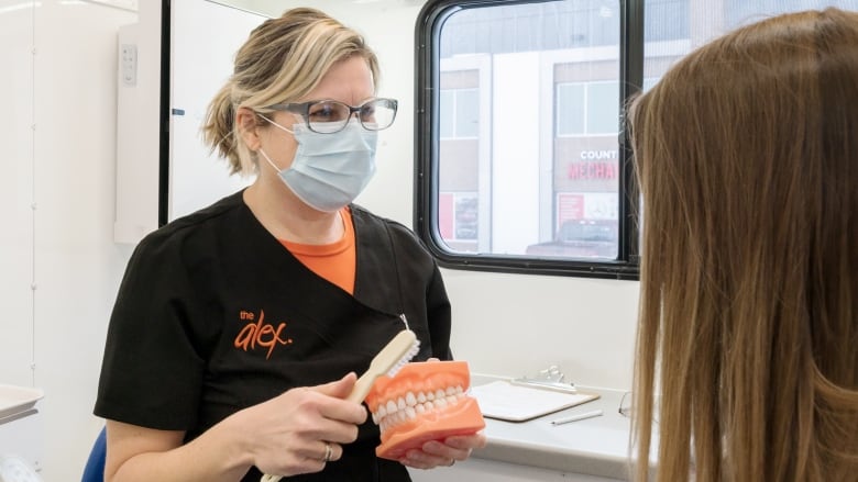 Shannon Hawryluk and the rest of The Alex's oral health team visit schools around the city, offering basic care. They also help families navigate the dental care system.