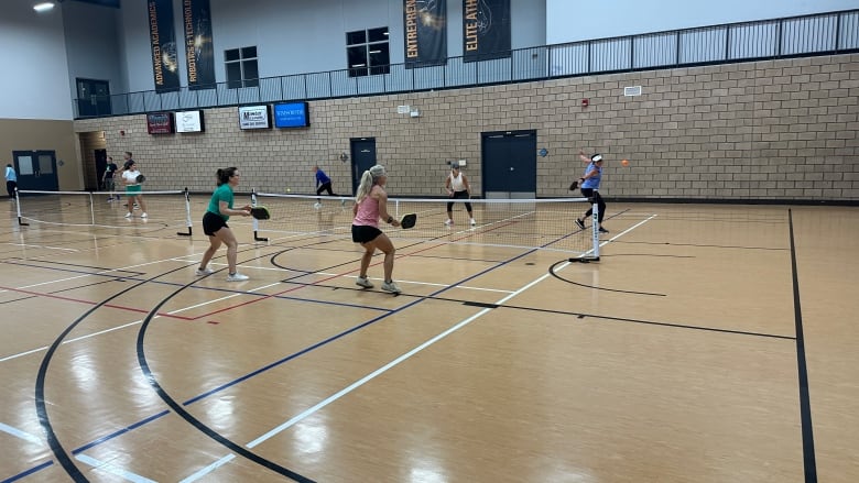 People with Windsor Pickleball Club play pickleball at the WFCU Centre.