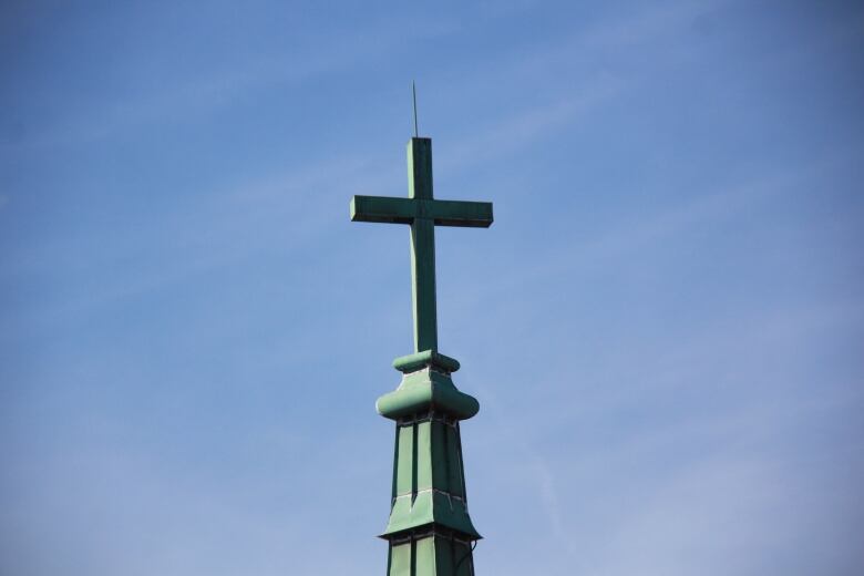 A cross at the top of Most Precious Blood Parish in Windsor, Ont.