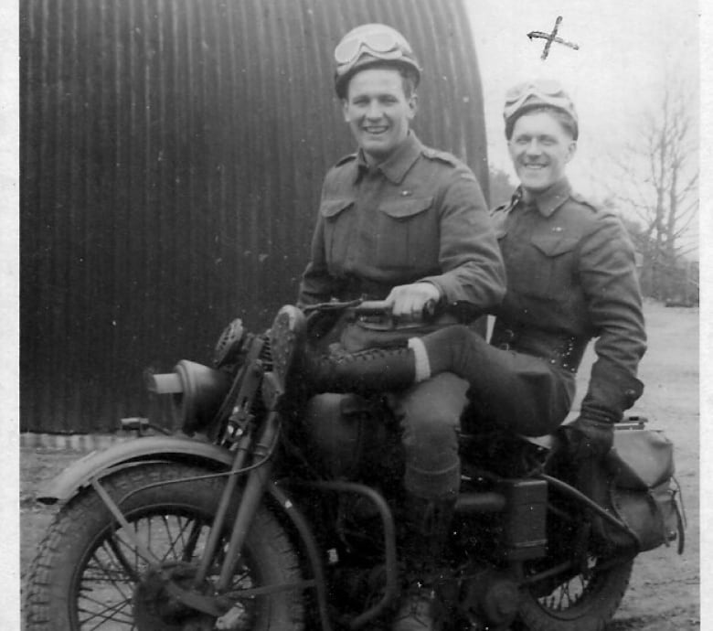 The last photo believed to be taken of William Chaters in 1944 in France sitting on the back of a motorcycle with an unidentified soldier.