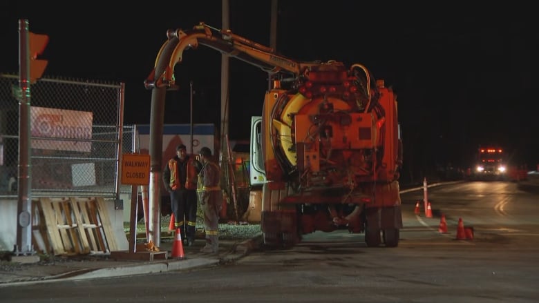 A large sewage pump sits on a truck.