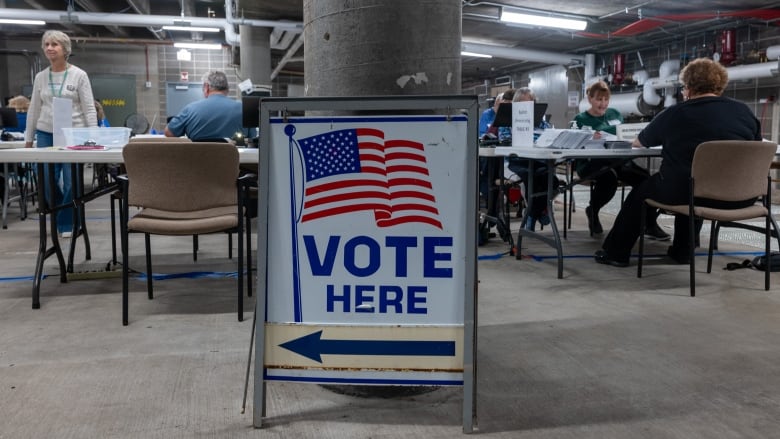 Poll workers in Jamesville, Wis., count ballots on the day of the national U.S. election in 2024.