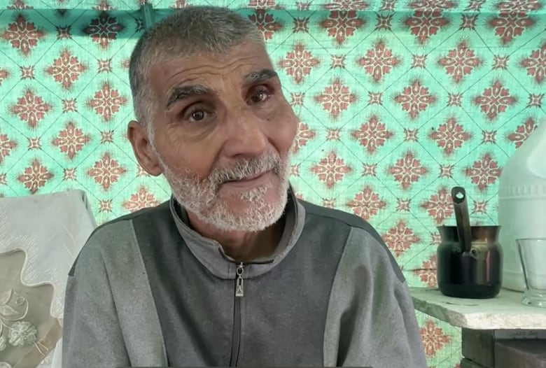 Hashem Yehia el Laham, a 63 year old father of seven,  was forced to flee from his home in Jabalia and is now living in a tent in Yarmouk Stadium in Gaza city.