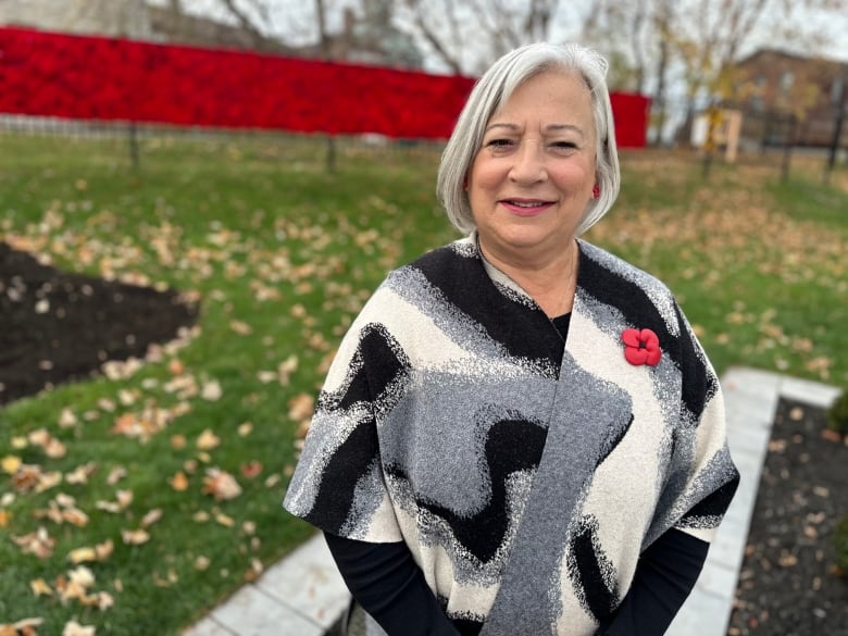 women with grey hair at cenotaph 