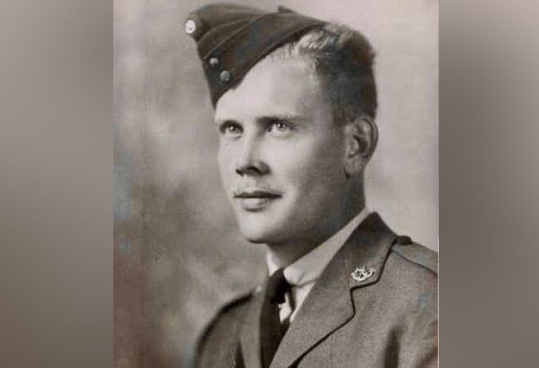 A black and white photo of a young army major.