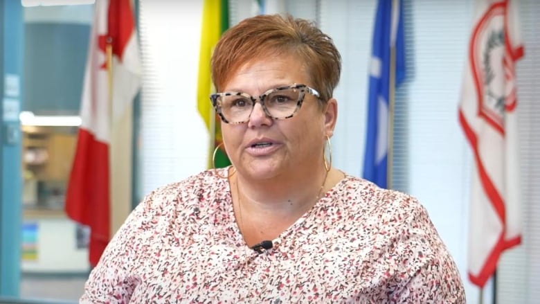 High school teacher Michele Schwab speaking during an on-camera interview about receiving Governor General's History Award for Excellence in Teaching. 